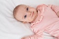 Adorable caucasian baby smiling confident lying on bed at bedroom Royalty Free Stock Photo