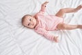 Adorable caucasian baby smiling confident lying on bed at bedroom Royalty Free Stock Photo