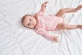 Adorable caucasian baby smiling confident lying on bed at bedroom Royalty Free Stock Photo