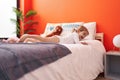 Adorable caucasian girl smiling confident lying on bed at bedroom Royalty Free Stock Photo