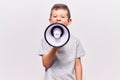 Adorable caucasian kid boy with angry expression Royalty Free Stock Photo