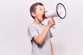 Adorable caucasian kid boy with angry expression Royalty Free Stock Photo