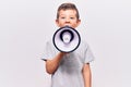 Adorable caucasian kid boy with angry expression Royalty Free Stock Photo