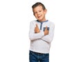 Adorable caucasian kid wearing casual clothes happy face smiling with crossed arms looking at the camera Royalty Free Stock Photo