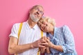 adorable caucasian mature couple stand together holding hands Royalty Free Stock Photo