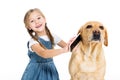 adorable cheerful child giving smartphone to dog,