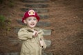 Adorable Child Boy with Fireman Hat Playing Outside Royalty Free Stock Photo