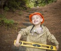 Adorable Child Boy with Level Playing Handyman Outside