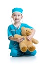 Adorable child with clothes of doctor on white Royalty Free Stock Photo