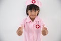 Child girl uniformed as doctor or nurse