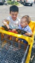 Adorable Chinese Caucasian Baby Boy and Brother Having Fun