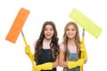 Adorable clean freaks. Cute girls holding mops for cleaning floor. Small cleaning ladies. Little cleaners with modern