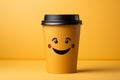 Adorable coffee cup persona on yellow backdrop, sporting a grin Copy friendly atmosphere Royalty Free Stock Photo