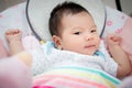 Adorable cute Asian baby lay down for sleep on bed at bedtime Royalty Free Stock Photo