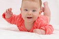 Adorable cute little girl with big blue eyes and wide smile play Royalty Free Stock Photo