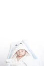 Adorable cute newborn baby boy on white background. The lovely child wore a rabbit costume with long ears. Holiday, Easter Royalty Free Stock Photo