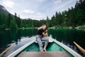 Hipster travel woman with best friend pet on boat Royalty Free Stock Photo