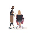 Adorable friendly lady hairdresser in protective mask does hair of her smiling female client sitting in chair isolated on white ba