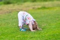 Adorable funny baby girl with her head down Royalty Free Stock Photo