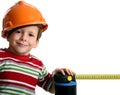 Adorable future architect in helmet with rule Royalty Free Stock Photo