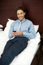 Adorable gentleman reading text sms on phone Royalty Free Stock Photo