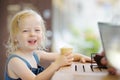 Adorable girl eating ice cream Royalty Free Stock Photo