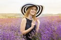 Adorable girl in fairy field of lavender