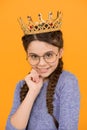 Adorable girl in glasses. Happy smiling princess. Excellent pupil. Success and happiness. Smartest princess. Intelligent