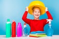 Adorable girl holding a yellow basin near her head