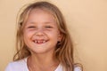 Adorable girl with messy mouth in chocolate