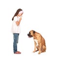 Adorable girl ordering silence his dog