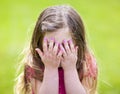 Adorable girl playing peek a boo Royalty Free Stock Photo