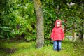 Adorable girl at rainy day in autumn Royalty Free Stock Photo