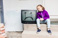 Little girl and vintage TV Royalty Free Stock Photo