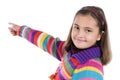 Adorable girl with woollen jacket pointing