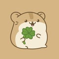 Adorable and Happy Hamster with a Lucky Clover Royalty Free Stock Photo