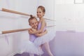 Two adorable little ballerinas at dance class