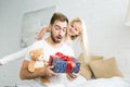 Adorable happy little daughter looking at surprised father Royalty Free Stock Photo