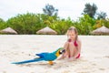 Adorable happy little girl with colorful parrot Royalty Free Stock Photo