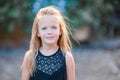 Adorable happy little girl outdoors in italian city. Portrait of caucasian kid enjoy summer vacation in Rome Royalty Free Stock Photo