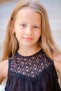 Adorable happy little girl outdoors in italian city. Portrait of caucasian kid enjoy summer vacation in Rome Royalty Free Stock Photo