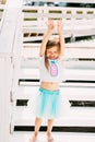 Adorable happy smiling little girl on beach vacation Royalty Free Stock Photo