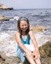 Adorable happy smiling little girl on beach vacation Royalty Free Stock Photo