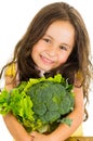 Adorable healthy little girl holding salad bowl