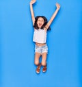 Adorable hispanic child girl wearing casual clothes smiling happy Royalty Free Stock Photo