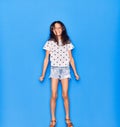 Adorable hispanic child girl wearing casual clothes smiling happy Royalty Free Stock Photo