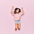 Adorable hispanic child girl wearing casual clothes smiling happy Royalty Free Stock Photo