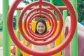 Adorable and Holiday Concept : Cute little child feeling funny and happiness on playground.