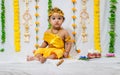 adorable infant dressed as hindu god krishna on the occasion of janmashtami celebrated at india