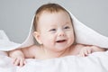 Adorable infant under blanket Royalty Free Stock Photo